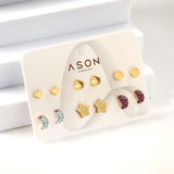 Six pairs of mixed mounted cut-out clay moon / shell stud earrings gold color