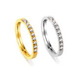 Solitaire ring with 10 small round diamonds gold/steel color