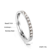 Solitaire ring with 10 small round diamonds gold/steel color