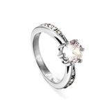 Solitaire ring with several small diamonds + one large round diamond Gold/steel color