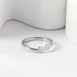 A beautifully designed ring with small round diamonds.