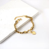 Circle bracelet with heart-shaped accessories 17+3cm gold