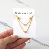 Gold/steel two-chain pendant jewelry set with rectangle and heart shapes