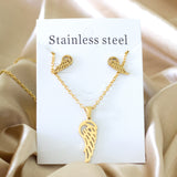 Steel/golden half of a wing shape faceted cut jewelry set without diamonds