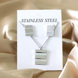 Steel/golden rectangle with two rectangles + shell jewelry set