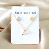 Steel/golden surface cut triangle jewelry set without diamonds in glossy finish