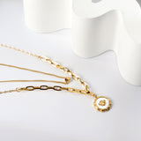 Collier pendentif composite coquillages blancs