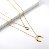 Colgante luna + diamante blanco doble cadena 48+5cm oro 18K