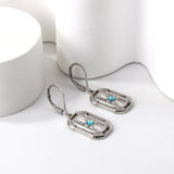 Boucles d'oreilles rectangulaires avec CZ bleu en or 18 carats