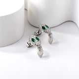 Snake with white diamonds + green diamonds earrings in 18k gold