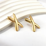 Pendientes en forma de X en oro de 18k