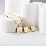 Square White Shell with Smiley Face Set Steel/Gold