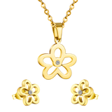 Gold/steel faceted cut jewelry set with diamonds in the center of a wispy flower