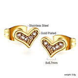 Gold crooked heart cut earrings with diamonds