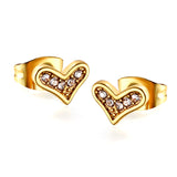 Gold crooked heart cut earrings with diamonds