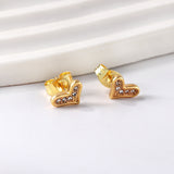 Gold crooked heart cut earrings with diamonds