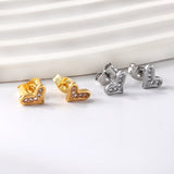 Pendientes de oro talla corazón torcido con diamantes