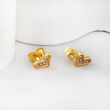 Gold crooked heart cut earrings with diamonds