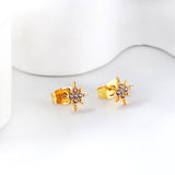 Golden lucky star cut earrings with diamonds