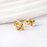 Pendientes de oro talla cola de pez con diamantes