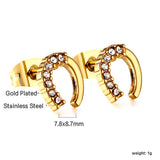 Gold U-shaped cut earrings with diamonds