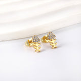 Gold fish bone cut earrings with diamonds