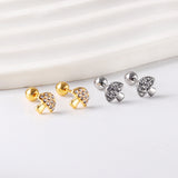 Gold coloured steel ball screw-in mushroom stud earrings with white diamonds