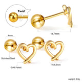 Gold coloured steel beads and screws heart cut-out earrings