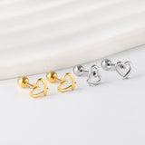 Gold coloured steel beads and screws heart cut-out earrings