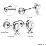 Gold coloured steel ball screw back fish shaped stud earrings with white pearls