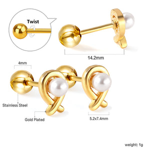 Gold coloured steel ball screw back fish shaped stud earrings with white pearls