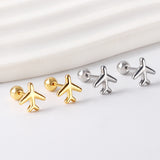 Gold coloured steel ball screw-in aeroplane stud earrings