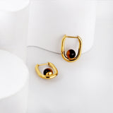 Gold coloured U-shaped ear clips with brown bead studs