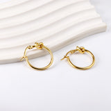 Gold knotted ear clasps