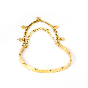 Hard bangle in gold color with end chain & star accessory