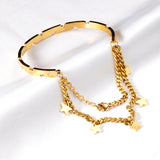 Hard bangle in gold color with end chain & star accessory