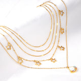 Fan + star pendant with mixed diamonds five chains 45 + 39 + 37 + 36 + 35 + 5cm gold