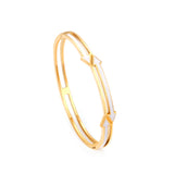 Gold colored hard bracelet with directional arrows with oil dripping in the center white color