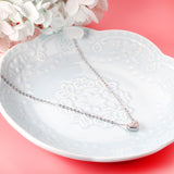 Heart pendant necklace with white diamonds 40+5cm steel color