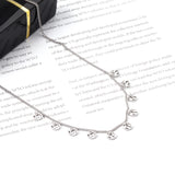 0.4 Side chain 40+5cm Necklace with 10 5mm round trees in polished finish