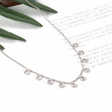 0.4 Side chain 40+5cm Necklace with 10 5mm round trees in polished finish