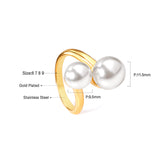 Two large and two small pearls in open pearl setting ring