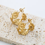 Stainless steel fresh simple personality retro C-shaped small daisy flowers female 18K gold earrings