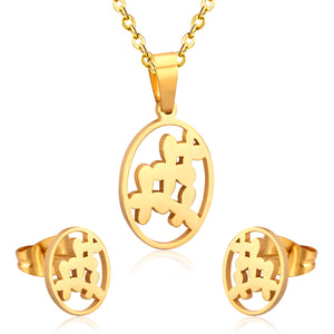 Steel/golden cut jewelry set with grass-like shape in the center without diamonds