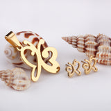 Gold/steel cut jewelry set in the shape of a butterfly with two tentacles without diamonds