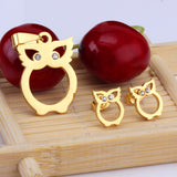 Gold/steel color owl with two eyes made of diamonds and a body with a hollow design and a smooth cut surface Jewelry Set