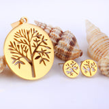 Gold/steel color jewelry set with a smooth surface and a hollow center in the shape of a tree.