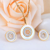 Gold/steel color white shells set with diamonds on top of circle with diamonds jewelry set