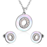 Gold/steel color white shells set with diamonds on top of circle with diamonds jewelry set