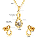 Steel/golden figure 8 cut faceted jewelry set with pearl